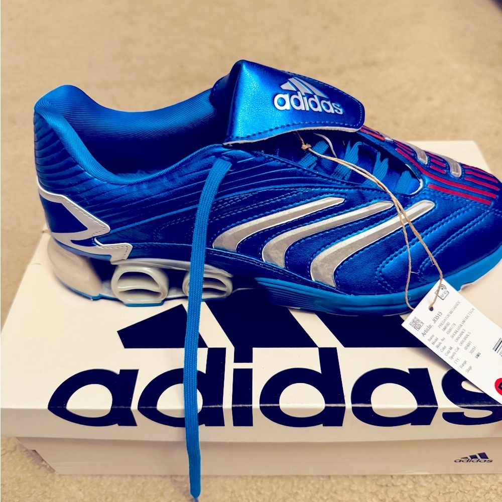 A brand new , never worn before , pair of Adidas Predator Megaride , sneakers.